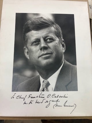 Item #21-7349 SECRETARIAL INSCRIBED AND SIGNED PHOTO OF JOHN KENNEDY AS PRESIDENT. John F. Kennedy
