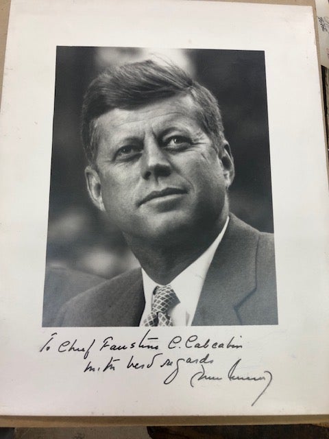 Item #21-7349 SECRETARIAL INSCRIBED AND SIGNED PHOTO OF JOHN KENNEDY AS PRESIDENT. John F. Kennedy.