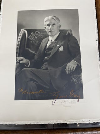 ORIGINAL SIGNED PHOTOGRAPH OF ZANE GREY AND INSCRIBED TO HIS SECRETARY BROWNELLA BAKER. Zane Grey.