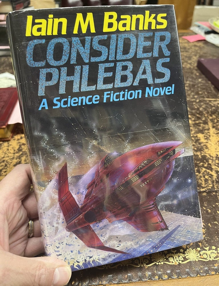 Item #23-1627 CONSIDER PHELEBAS. Iain M. Banks.